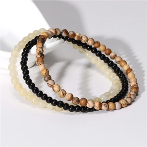 Detailed macro view of 4mm natural amethyst and agate beaded elastic bracelets set
