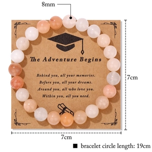Detailed view of 8mm pink zebra jasper beads on a graduation gift card 19cm bracelet