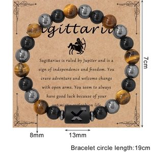 Bracciale in perline Occhio di Tigre ed Ematite Sagittario su carta di presentazione