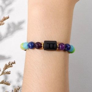 Bracciale Gemelli in pietre naturali con pietre laviche e ciondolo zodiacale dorato