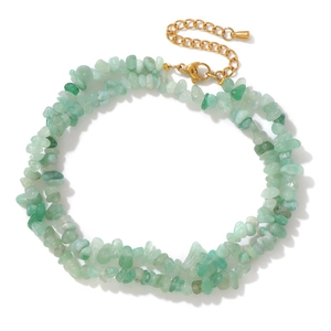 Detail of light green natural crystal stone double necklace with gold lobster clasp
