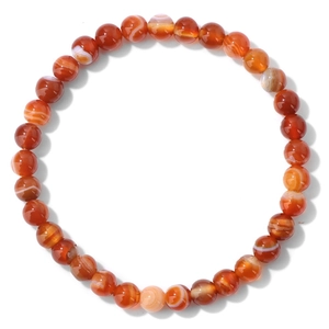 Macro detail of natural red striped agate beads bracelet with unique white silk textures