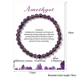 Detailed view of 6mm Amethyst bead bracelet with printed product information card