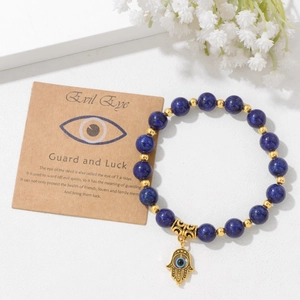 Bracelet en perles de lapis-lazuli main de fatma avec breloque œil porte-bonheur