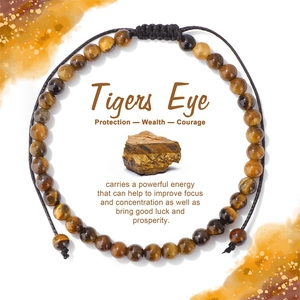 Détail d'un bracelet en perles d'oeil de tigre 4 mm avec cordon tissé à la main réglable