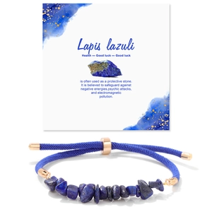 Lapis lazuli stone bracelet with dark blue woven cord and adjustable rose gold slider