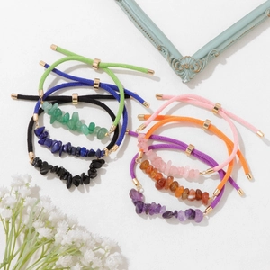 Adjustable woven rope bracelet set with irregular natural amethyst and healing crystals