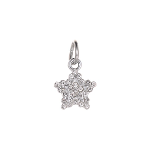 Close-up of silver star pendant charm with sparkling round zircons for DIY jewelry