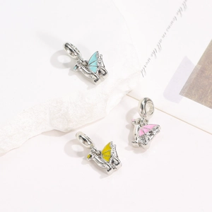 Three dragon charms for DIY bracelets in blue, purple, and yellow enamel silver metal