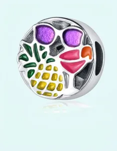 Macro detail of summer charm with pineapple, sunglasses and cocktail patterns