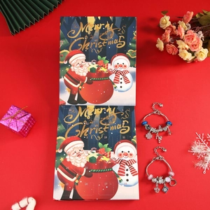 Detailed view of DIY Christmas countdown calendar set with festive beads and bracelets