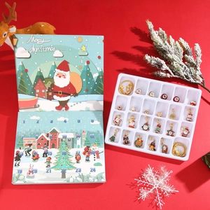 Christmas Advent Calendar with 24 gold DIY charm bracelet pieces in festive gift box