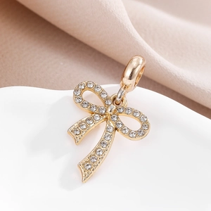 Colgante de lazo dorado con diamantes de imitación para creación de joyas DIY