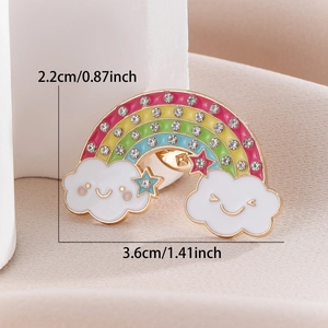 Detail of colorful rainbow brooch with sparkling rhinestones and smiling clouds decor