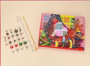 Detailed view of DIY Christmas advent calendar jewelry set with beads and bracelets