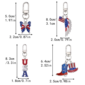 Detailed views of American flag themed keychains with wings and USA charms in blue and red