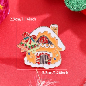 Detail of Christmas gingerbread house brooch with dimensions in white and red enamel