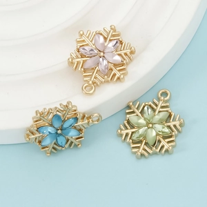 Charming colorful snowflake charms with gold metal frames for DIY jewelry and necklaces