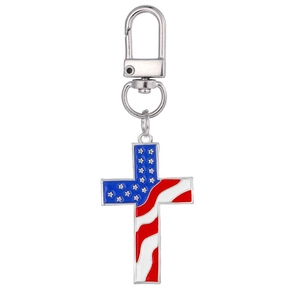Detail of cross keychain with American flag enamel pattern and silver lobster clasp