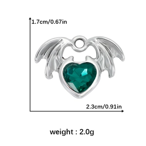 Detail view of silver heart wing pendant with green gemstone and dimensions shown