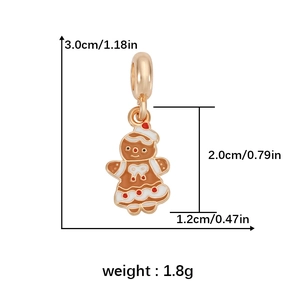Detailed view of gingerbread man charm with enamel finish for Christmas bracelets