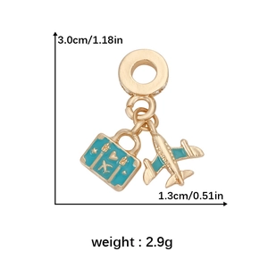 Travel theme charm with blue enamel airplane and luggage pendant and size dimensions