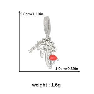 Detail view showing a palm tree and flamingo charm with white crystals and red enamel