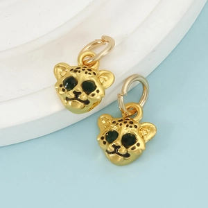 Golden leopard head charm with black enamel spots and green stone eyes for jewelry