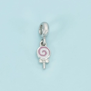 Pink and white lollipop charm with silver bow detail and large hole bead for jewelry