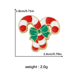 Detail of candy cane Christmas brooch with green bow including size and weight specs