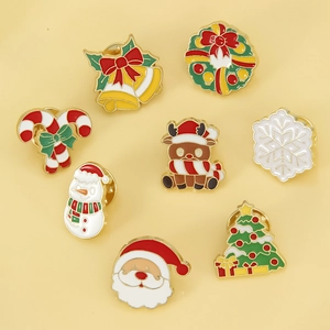 Set of 8 Christmas enamel pins featuring Santa, reindeer, and snowman on yellow background