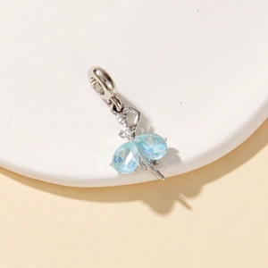 Detailed view of ballerina charm with blue teardrop crystals for DIY jewelry making