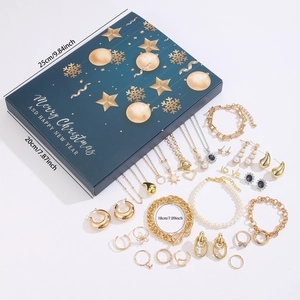 Detailed view of blue Christmas advent calendar box with 24 jewelry pieces and size labels