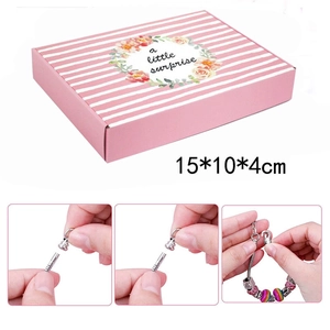DIY colorful crystal bead bracelet and necklace kit in a pink striped gift box