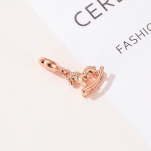 Rose gold rocking horse pendant charm for bracelets and necklaces with metallic finish