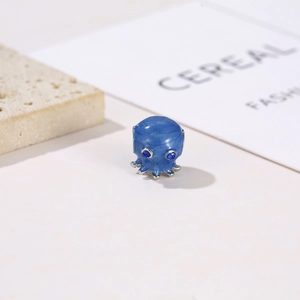 Charm poulpe en émail bleu avec paillettes et yeux en cristal pour bracelets