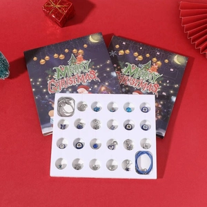 Calendario dell'Avvento natalizio con bracciali in argento e 22 ciondoli festivi blu