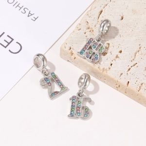 Detail of silver alloy number charms 16 18 21 with colorful rhinestones for DIY jewelry
