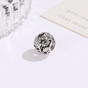 Vintage oxidized hollow leaf bead for DIY bracelet making with intricate feather patterns