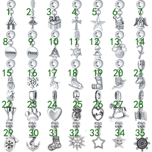 Set de 35 colgantes navideños plateados para manualidades con Papá Noel y copos