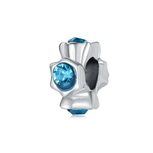 Detailed view of silver-tone floral charm with three deep blue crystal inlays