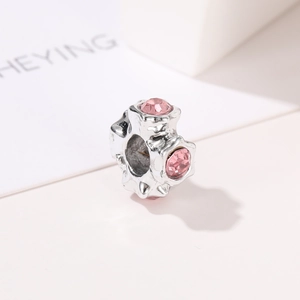 Star-shaped silver charm with pink faceted crystals for DIY jewelry making