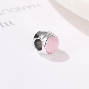 DIY Silberperle mit rosa Katzenauge-Stein für personalisierte Schmuckarmbänder