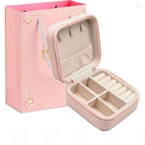 Portable pink jewelry travel case with zipper closure and matching gift bag set