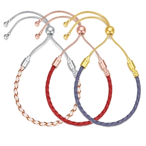 Adjustable woven leather rope bracelet with slider clasp in gold and silver finishes