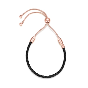 Detail of adjustable black leather cord bracelet with rose gold sliding metal closure