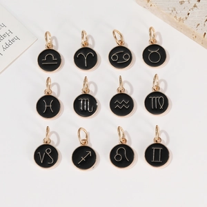 Set aus 12 Sternzeichen-Anhängern in Schwarz und Gold für DIY-Schmuckstücke