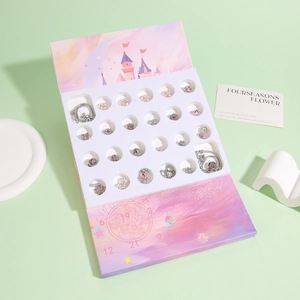 Roze kasteel kerst adventskalender met DIY bedelarmbanden en roze kralen set