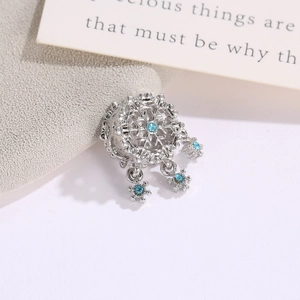 S925 silver snowflake charm with blue zircon tassels and hollow carving design