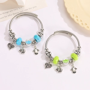 DIY beaded charm bracelet set with cute frog, elephant and angel wing pendants in silver finish